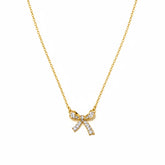 FREE SPIRIT BOW CHARM NECKLACE