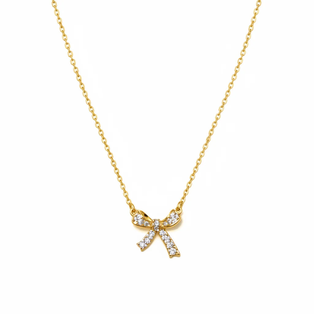 FREE SPIRIT BOW CHARM NECKLACE